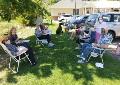 Seniors in Park City having a picnic outdoors